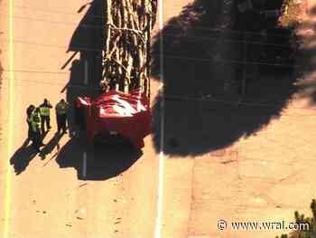 Driver killed after crashing into log truck on Knightdale Boulevard