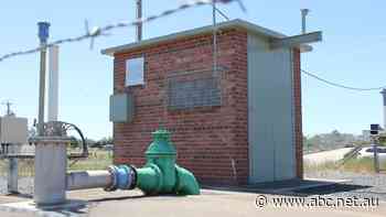 Contamination from a RAAF base was supposed to reach this city's water supply in the 2070s. It's already almost there