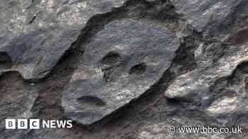 Brazil drought reveals ancient rock carvings of human faces