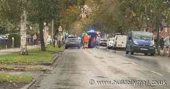 Emergency services in Calvert Road after car flips on its side - live updates