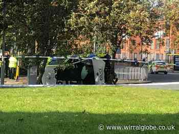 Woman remains in hospital after Birkenhead crash involving police car