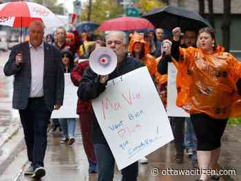 Union holds rally outside Canada Life office to highlight complaints over health-care plan