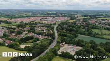 Builders pledge sport pitches and shops after legal threat