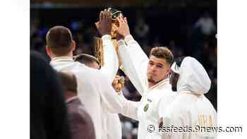 Jokic and the Nuggets receive rings, watch championship banner raised before tipping off season