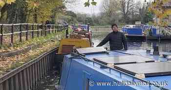 Thrifty couple live for 'free' in London - swapping pricey flat for canal boat they rent out at weekends - pocketing £20,000 a year