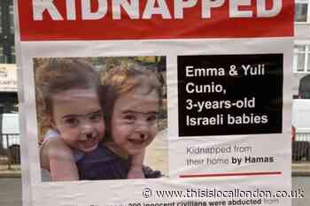 'Hitler' moustaches drawn on Israeli child hostage poster