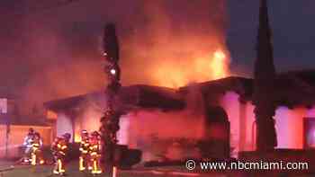 Video shows firefighters battle massive flames that engulfed Miami Springs home