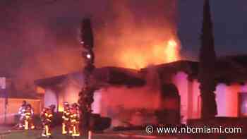 Video shows firefighters battle massive flames that engulfed Miami Springs home