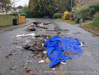 Lorry fly tipped rubbish over road in Skerton