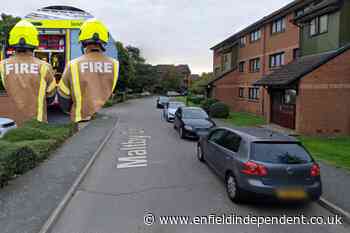 Police probe after fire two Enfield blocks of flats