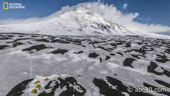 Lake of fire discovered at the top of an unexplored volcano in world's most remote location