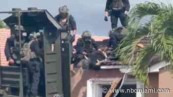 Officers pull retired MDPD lieutenant from roof after hours-long SWAT standoff