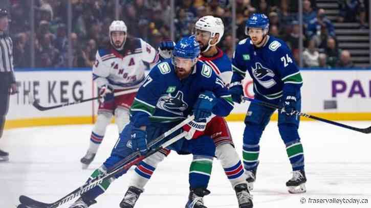 Rangers trip Canucks 4-3 in overtime thriller