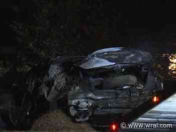 Two cars catch fire near a Durham home