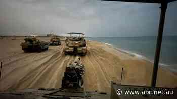 Israel releases images of tanks in Gaza, says call to evacuate southward now 'urgent'