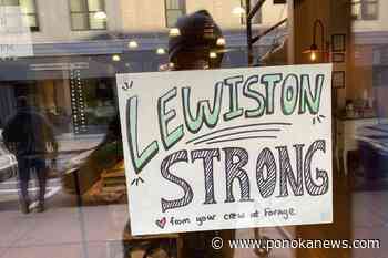 Residents of Maine gather to pray and reflect, days after a mass shooting