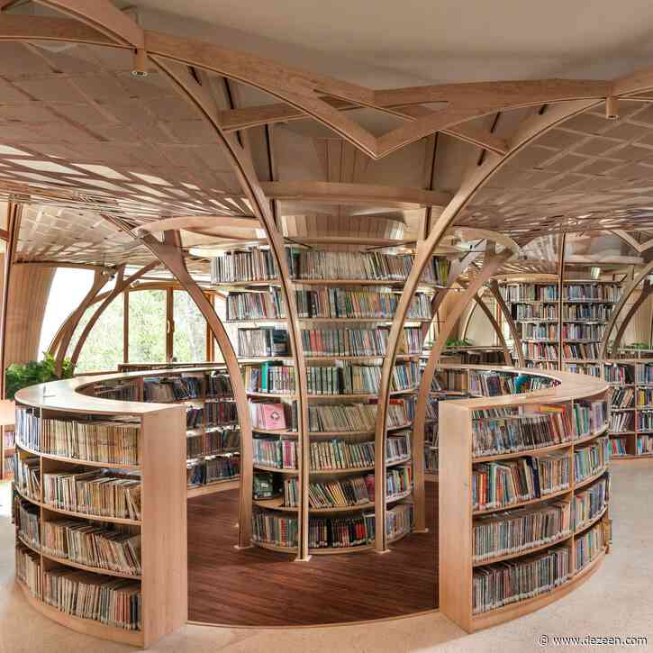 Studio Hinge creates library spaces beneath tree-like wooden columns