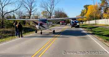 Flight instuctor makes emergency landing on two-lane road in Cary during lesson