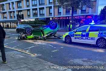 Brighton Road: Car crashes into railings outside Sutton Station