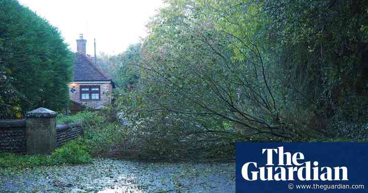 Storm Ciarán: schools closed and travel disrupted in UK amid ‘danger to life’