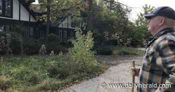 Once impressive home overlooking Round Lake being demolished