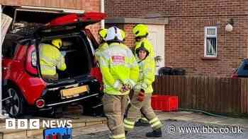 Man rescued after car goes through Colchester house