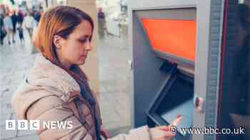 Bank holds interest rates and warns it's too early to cut