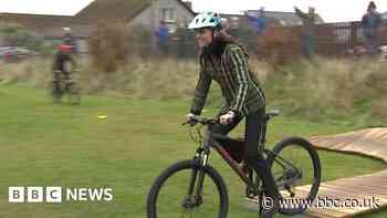 William and Kate don helmets to show off their bike skills in Scotland