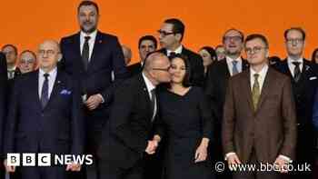 Minister's awkward EU summit kiss causes controversy