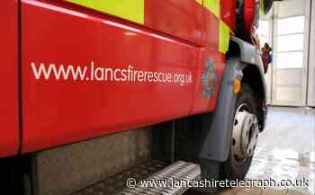 Three fire crews tackle blaze near retail park on Blackburn