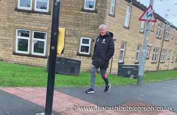 Ex-England boss out for a stroll in Rishton before game