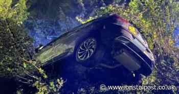Bristol firefighters called to car wedged in bush