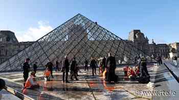 Climate-Protesting Art Vandals Attack Louvre’s Pyramid With Orange Paint