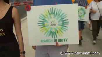 More than 100 people gathered to march against hate in Downtown Miami