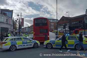 Tooting High Street bus crash: Woman dies