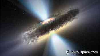 Star-birthing galaxies can hide supermassive black holes behind walls of dust