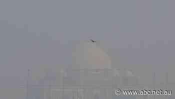 India's New Delhi is banning cars to curb rising air pollution as thick smog shrouds city