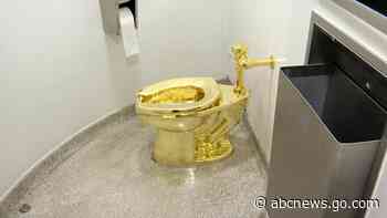 4 men charged in theft of satirical golden toilet at Churchill's birthplace