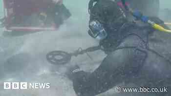 Watch divers recover trove of ancient Roman coins