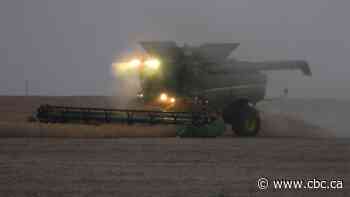 Witness dove into icy water in attempt to save Roblin man after combine rollover: RCMP