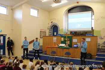 Rovers players visit Blackburn primary school kids