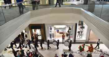 Santa arrives at Woodfield Mall to usher in the holidays