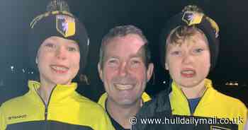 Heart-warming moment dad gets hero's welcome at finishing line of 31st half-marathon in 31 days