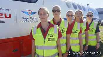 Queensland's flying nurses take a hi-vis approach as row over pay hangs in the air