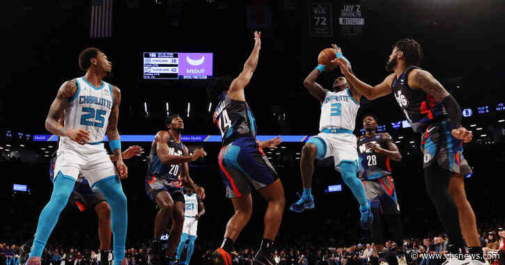 Rozier has 37 points and 13 assists, Hornets win to snap Nets' three-game winning streak