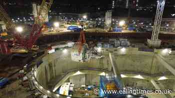 Easy does it! Borer lowered ahead of Northolt Tunnel work