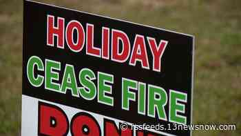 Anti-gun violence organization sending a message through signs ahead of holidays