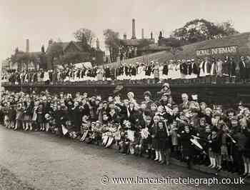 Queen's visit to Blackburn saw hundreds lining the route