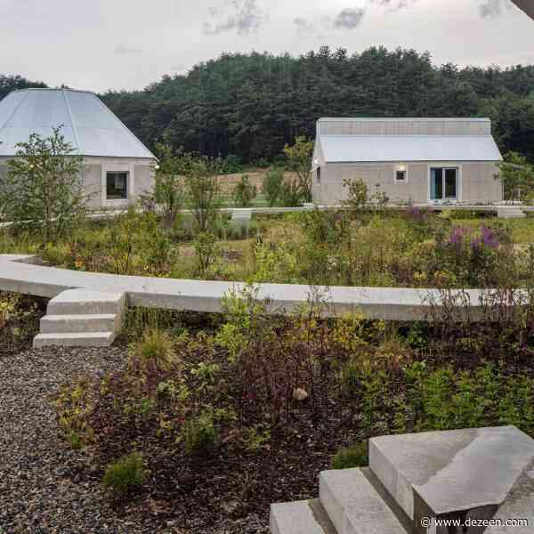 Concrete ring connects cluster of South Korean homes by AOA Architects