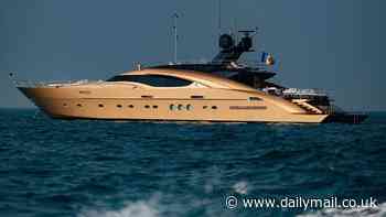 Inside the world's only superyacht painted in 24-karat GOLD that is available to charter for $120,000 a week - and even the jet skis have a metallic sheen